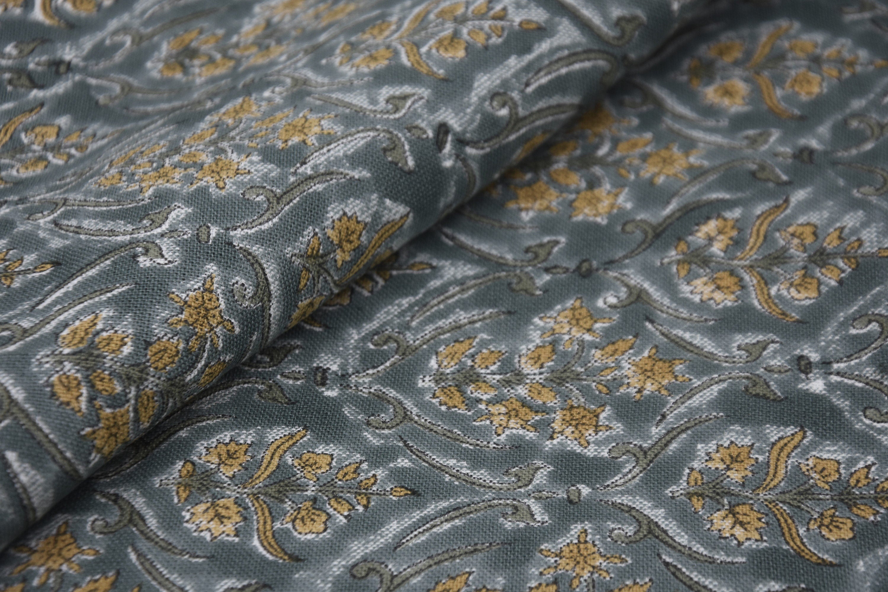 VISHAL PUSHP HAND BLOCK PRINTED FABRIC – THICK LINEN WITH LEAF PRINT IN GRAY & MUSTARD