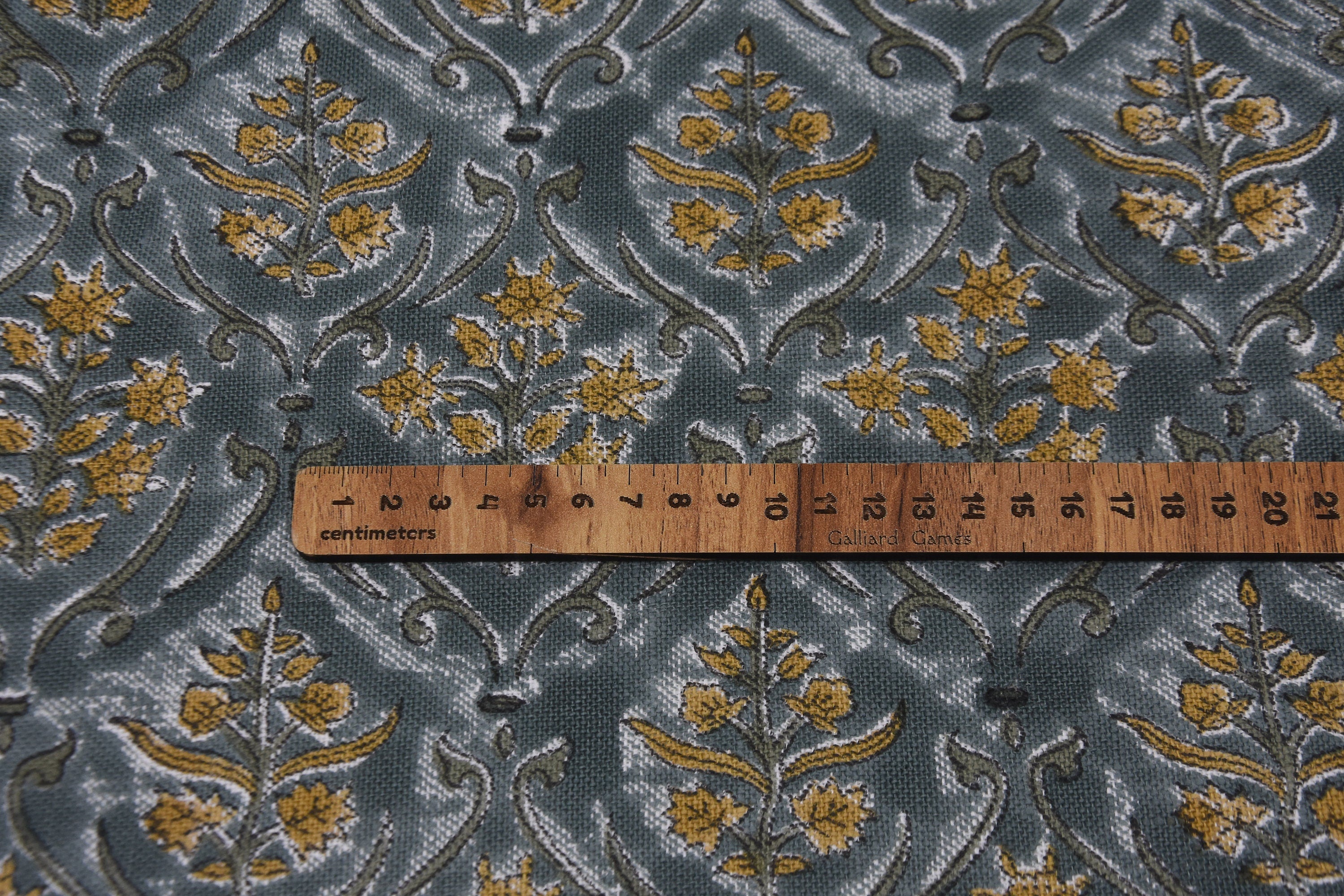 VISHAL PUSHP HAND BLOCK PRINTED FABRIC – THICK LINEN WITH LEAF PRINT IN GRAY & MUSTARD