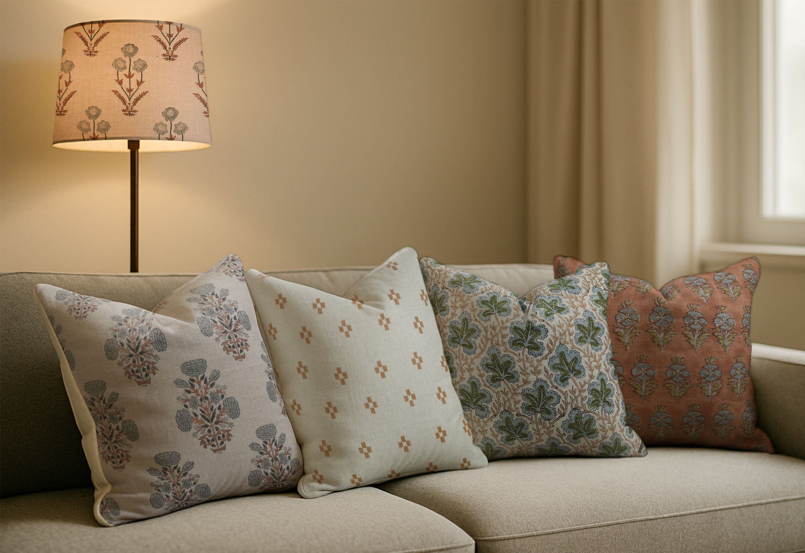 A cozy, naturally lit USA living room styled with black and white floral block printed pillow covers made from Fabritual’s artisan fabrics.