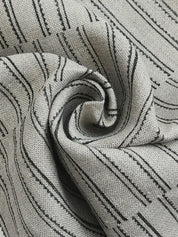 Detailed view of BAIKUNTH's black and white striped textile