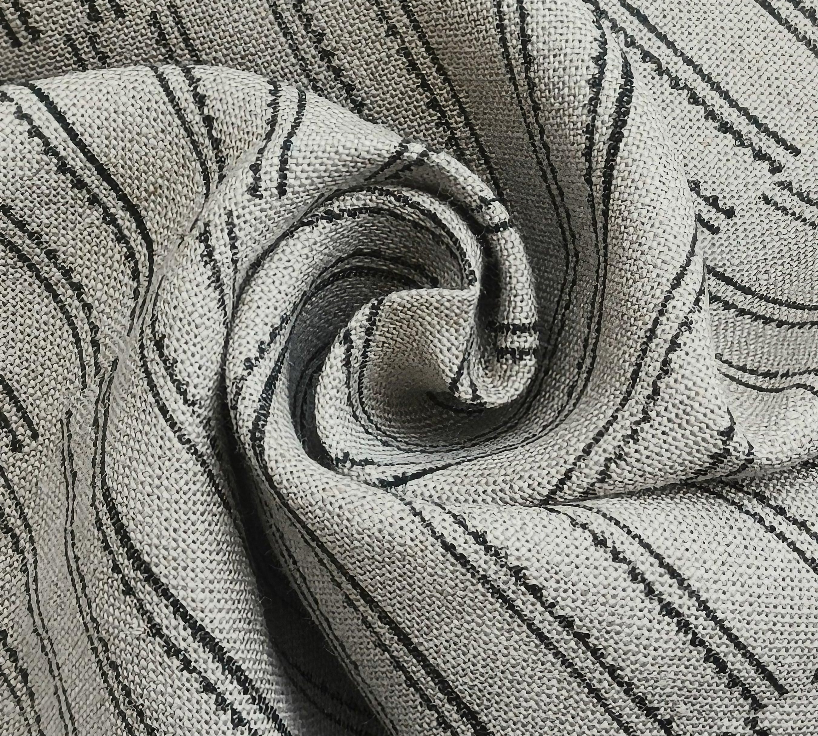 Detailed view of BAIKUNTH's black and white striped textile