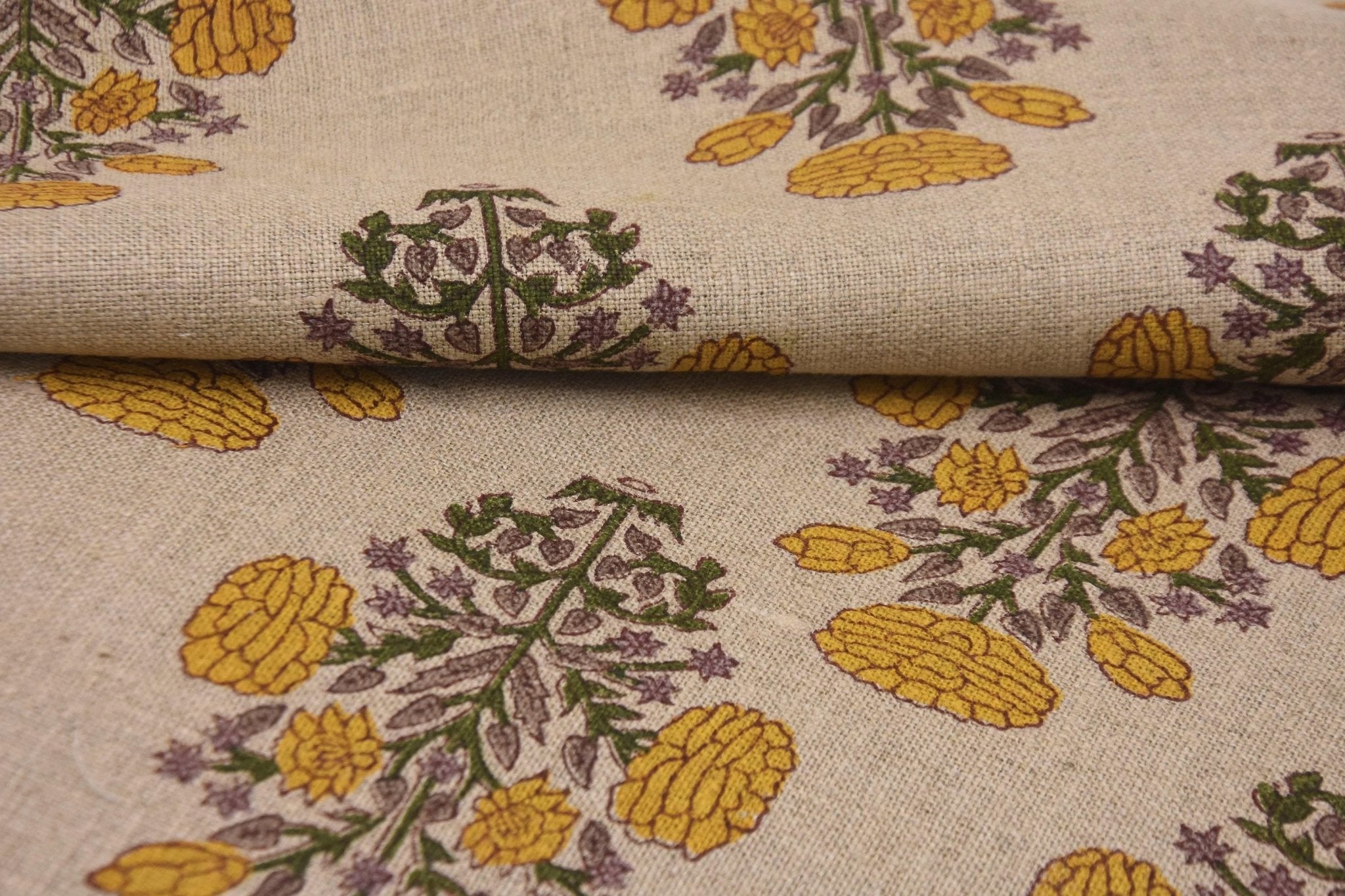 Natural linen fabric with floral motifs for chairs and cushion covers
Vintage floral hand block printed linen for drapes and bedding
Decorative thick linen with block print for sofa and curtains.