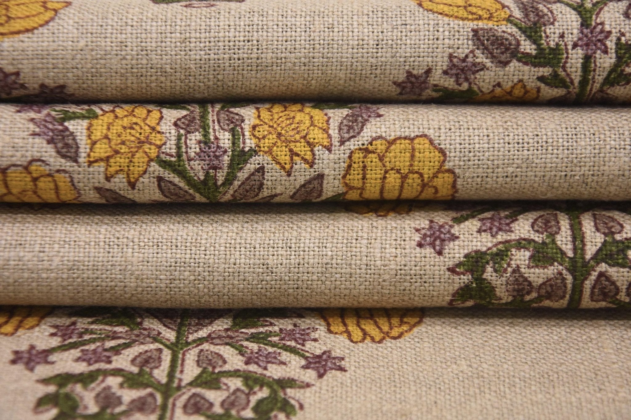 Traditional Indian linen block print for rustic napkin sets
Handcrafted linen for frilled pillow covers and upholstered stools
Floral linen upholstery fabric for farmhouse living decor.