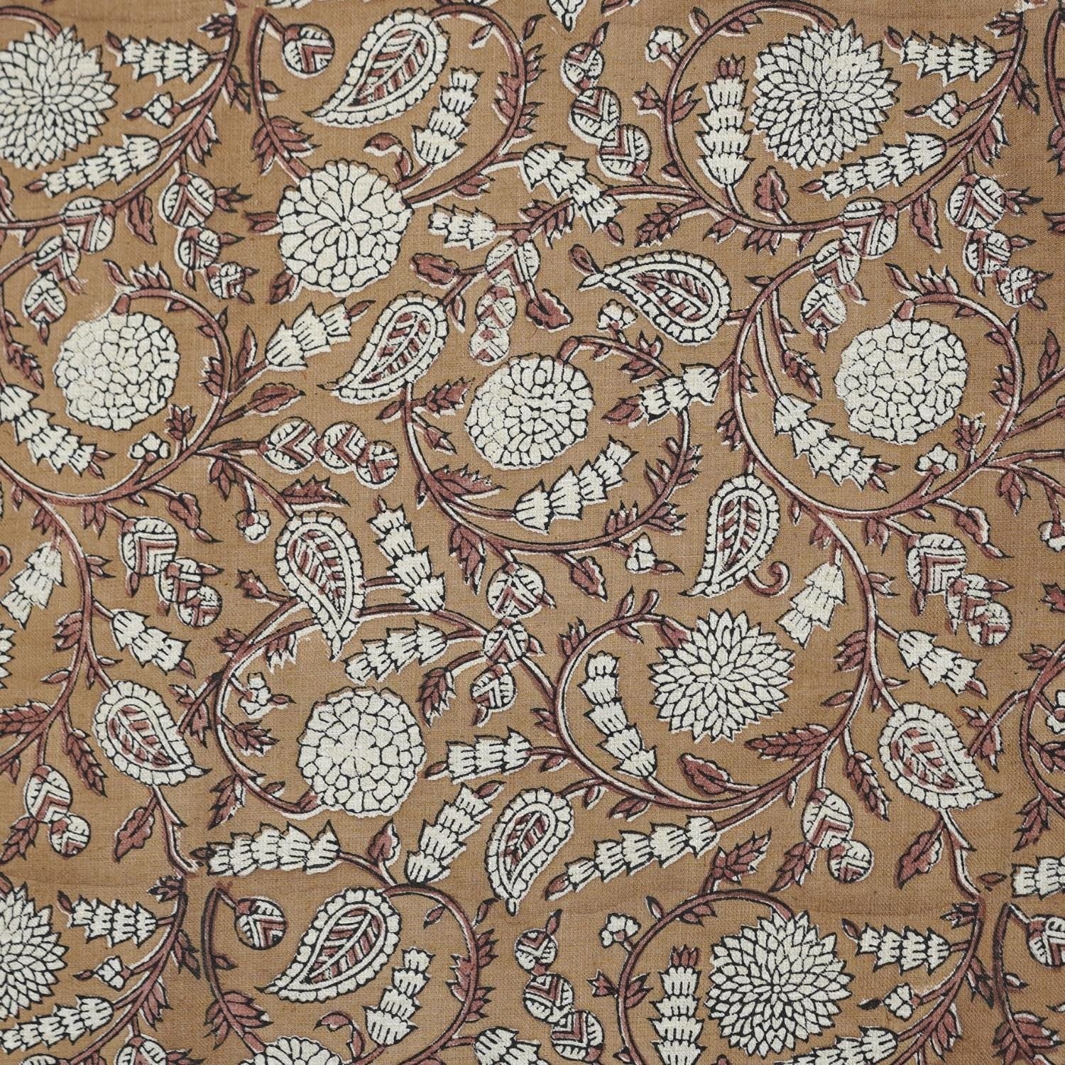 Farmhouse decor setting with Indian handmade block print brown linen fabric styled for elegant curtain panels and throw pillows.