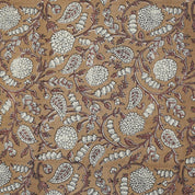 Farmhouse decor setting with Indian handmade block print brown linen fabric styled for elegant curtain panels and throw pillows.