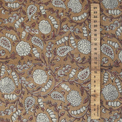 Brown Shilong block print on eco-friendly natural linen blend fabric, folded for sewing festive napkins, table covers, or cushion covers.