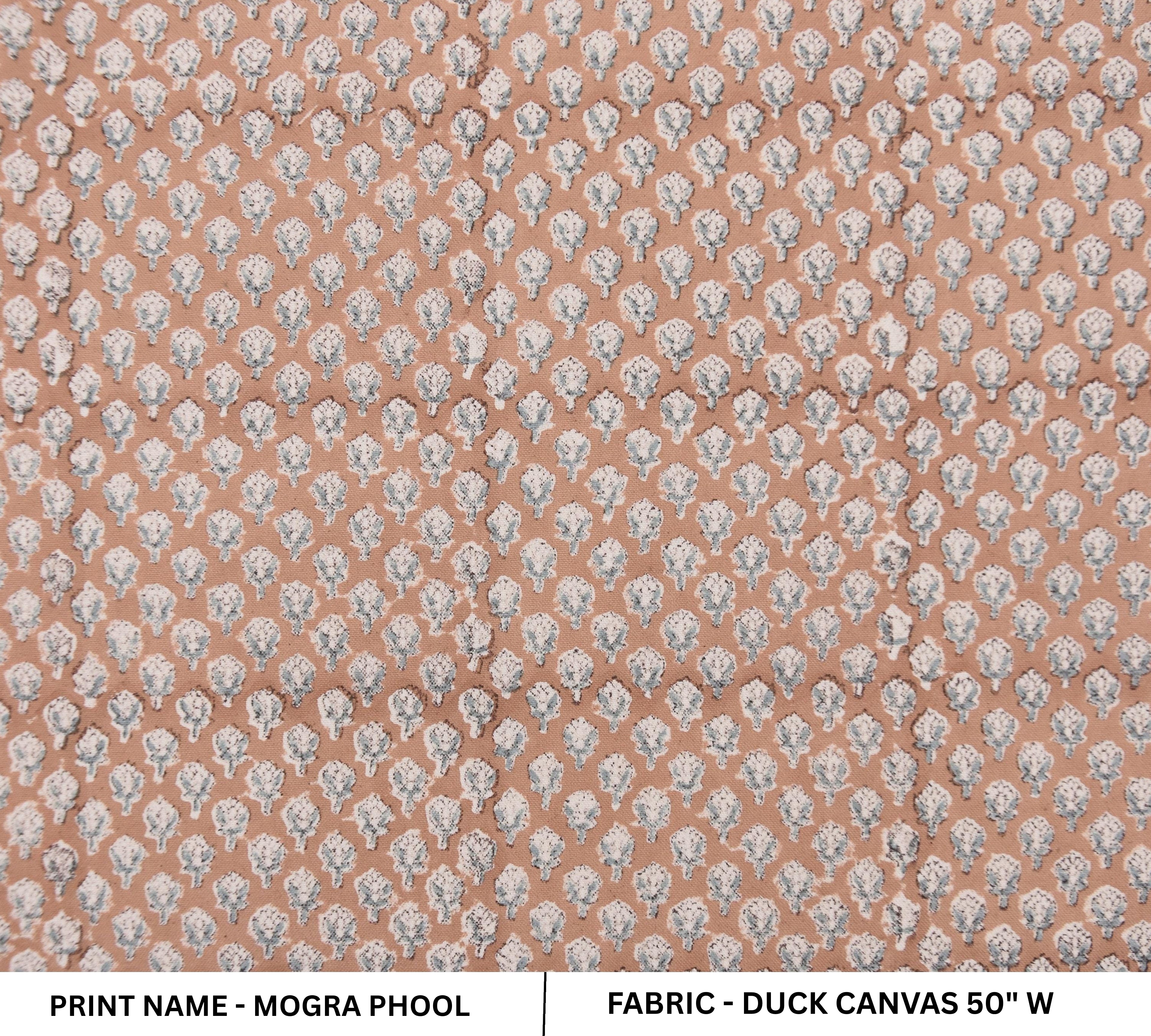 Patterned fabric with small floral design on a pink background