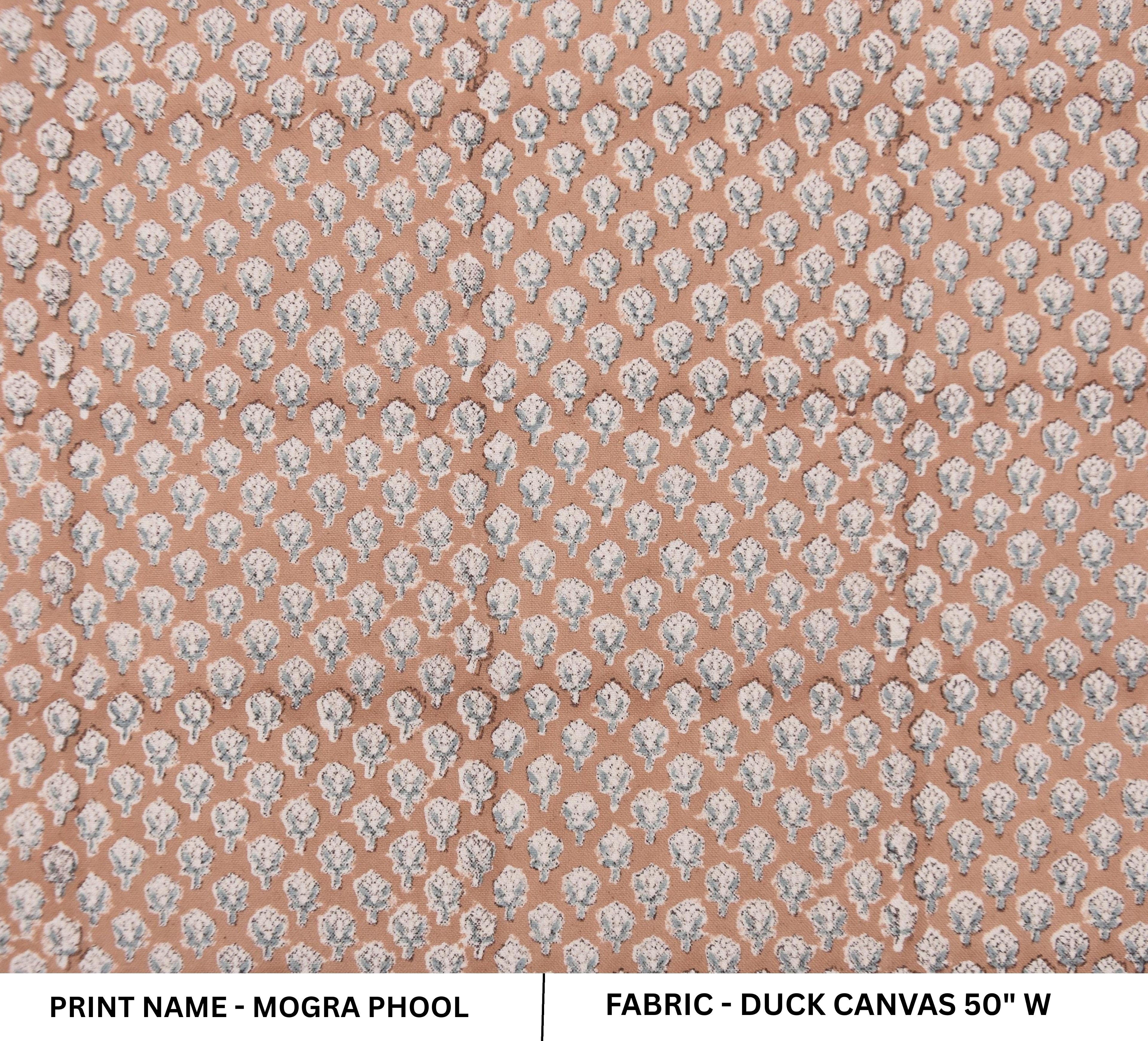 Patterned fabric with small floral design on a pink background
