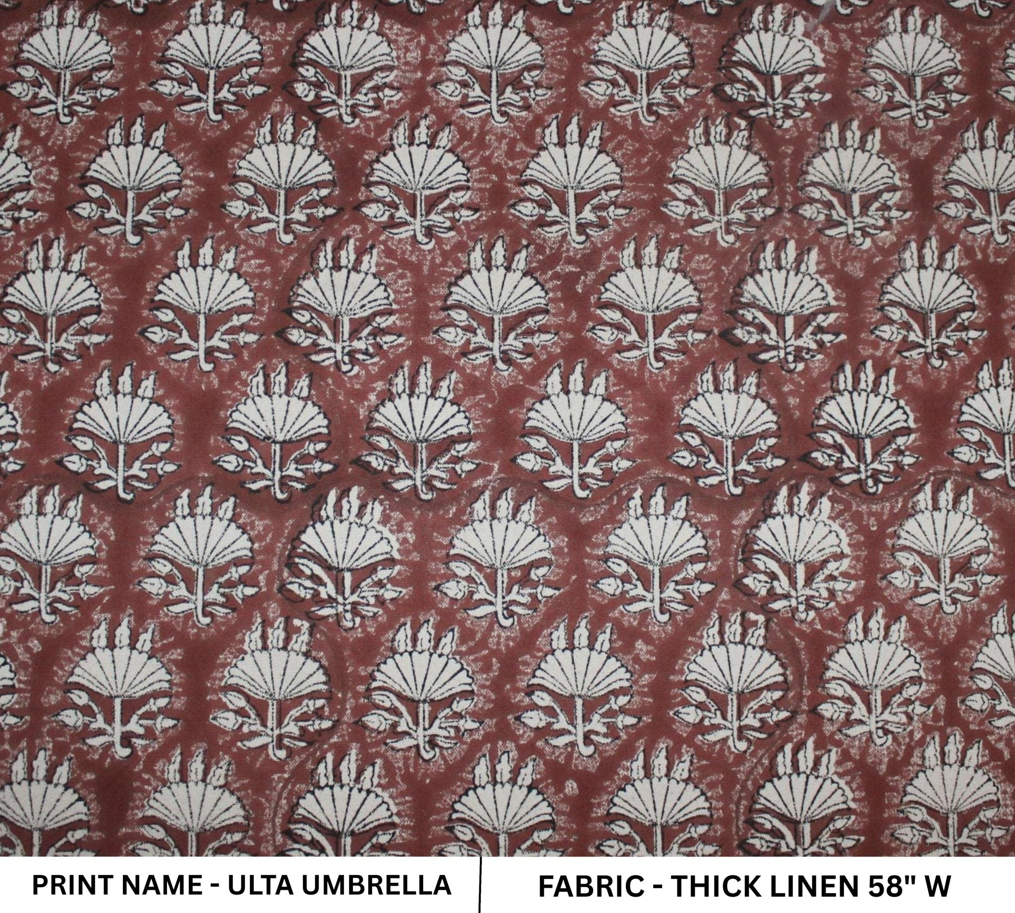 Patterned fabric with 'Ulta Umbrella' design on a red background