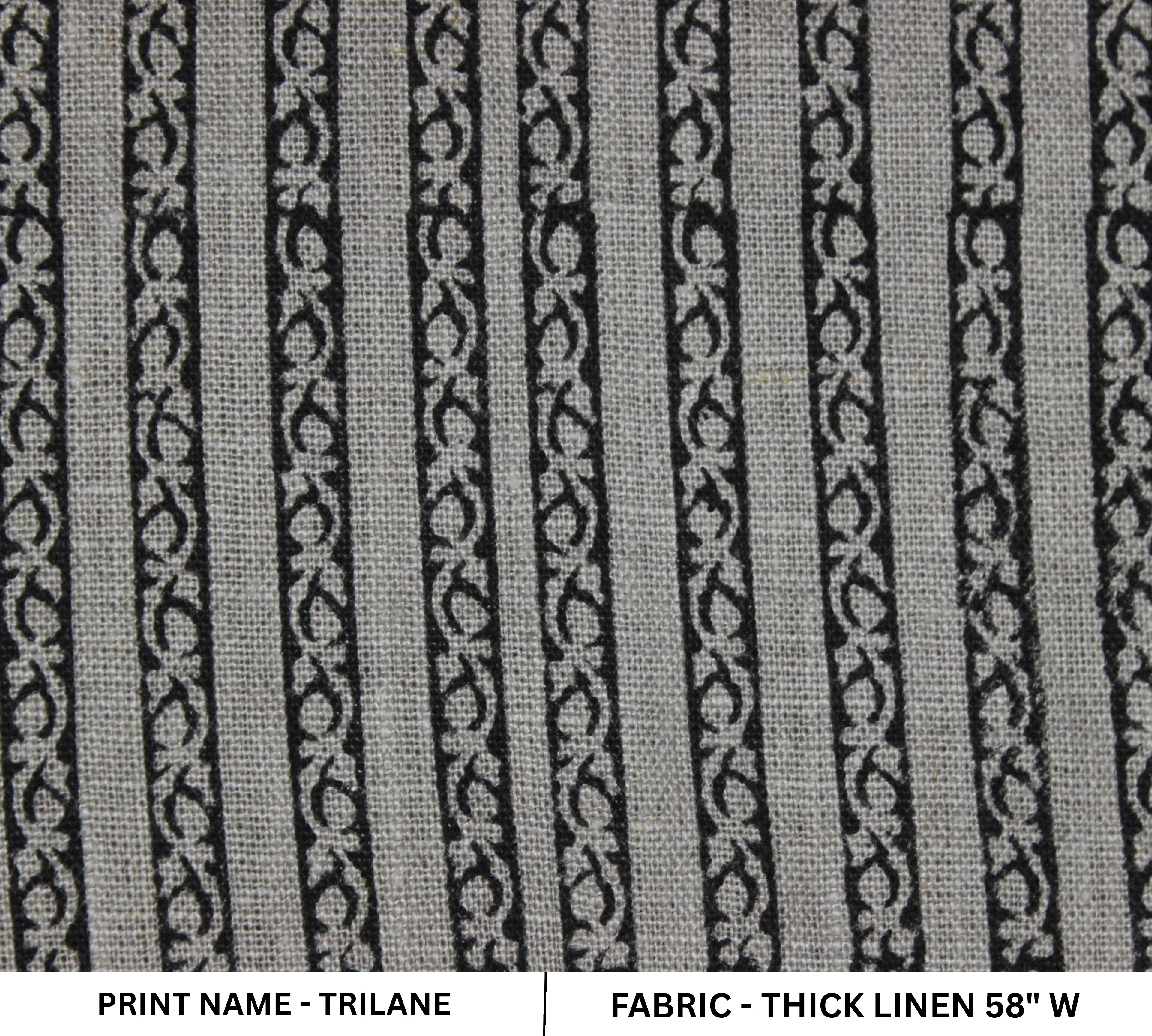 Patterned fabric with black and white design on a gray background