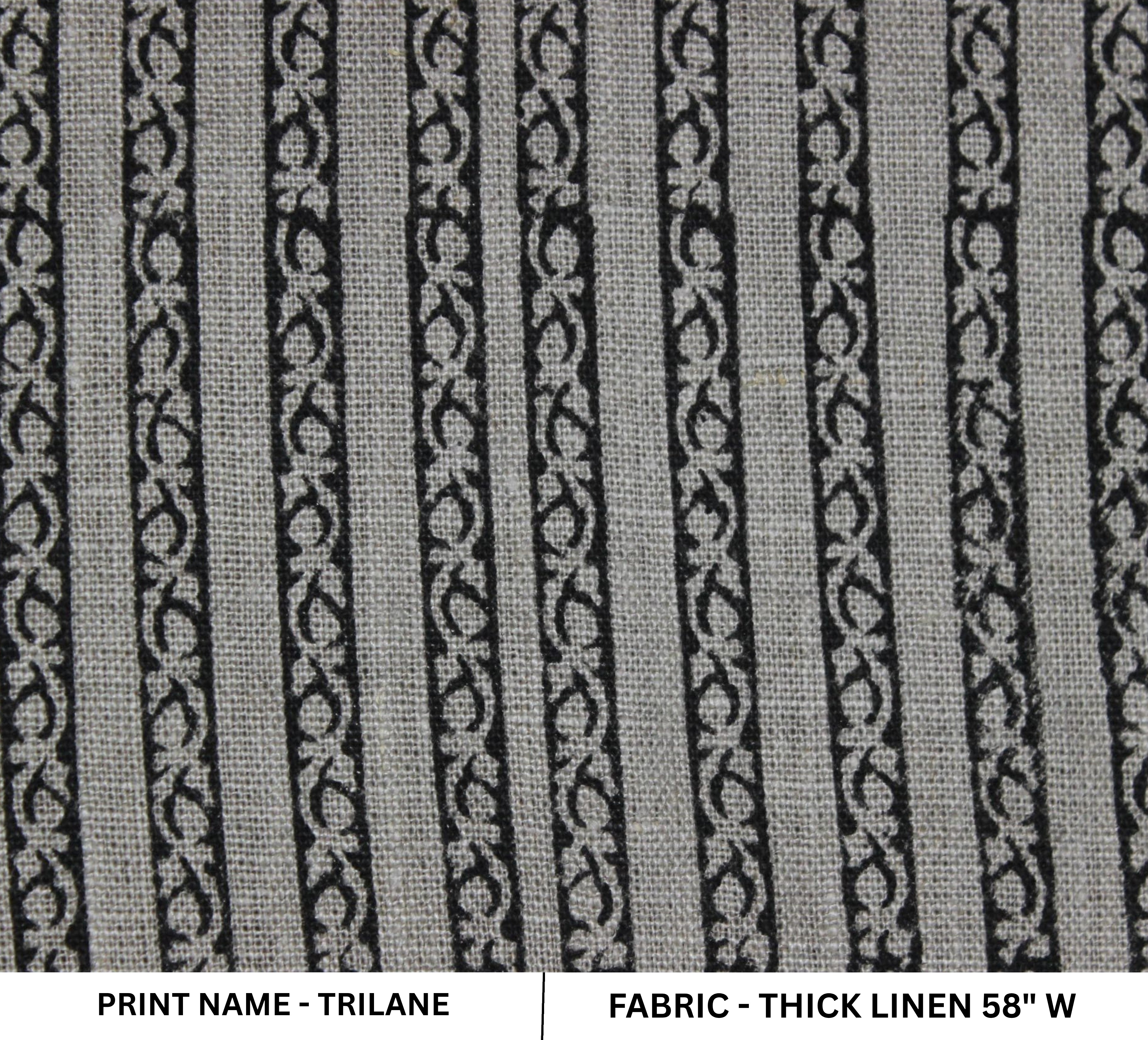 Patterned fabric with black and white design on a gray background