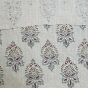 Patterned fabric with decorative elements on a neutral background