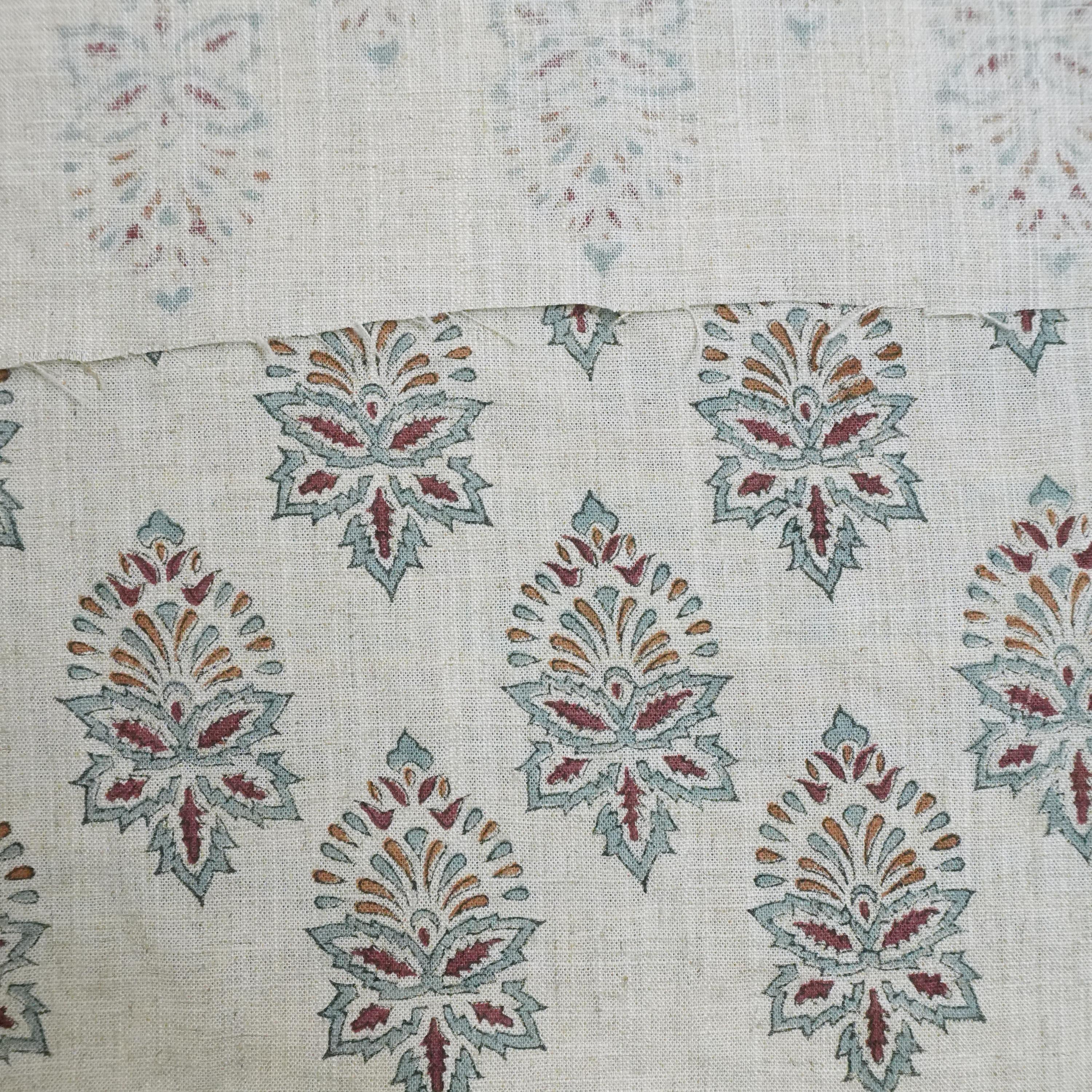 Patterned fabric with decorative elements on a neutral background