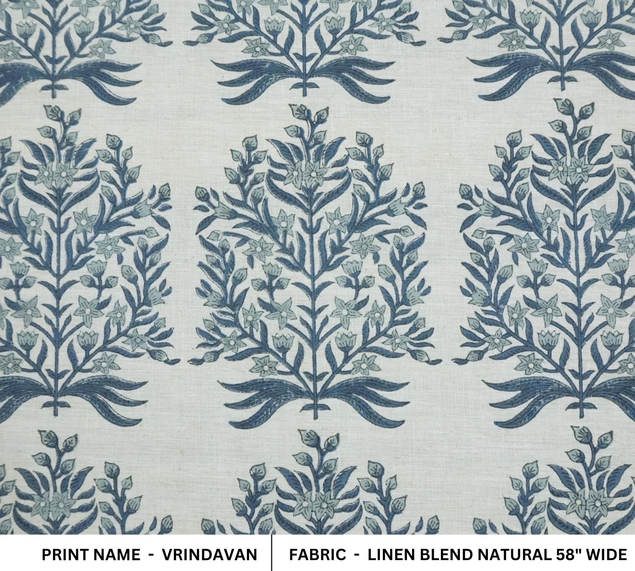Linen blend fabric with blue floral pattern on a light background