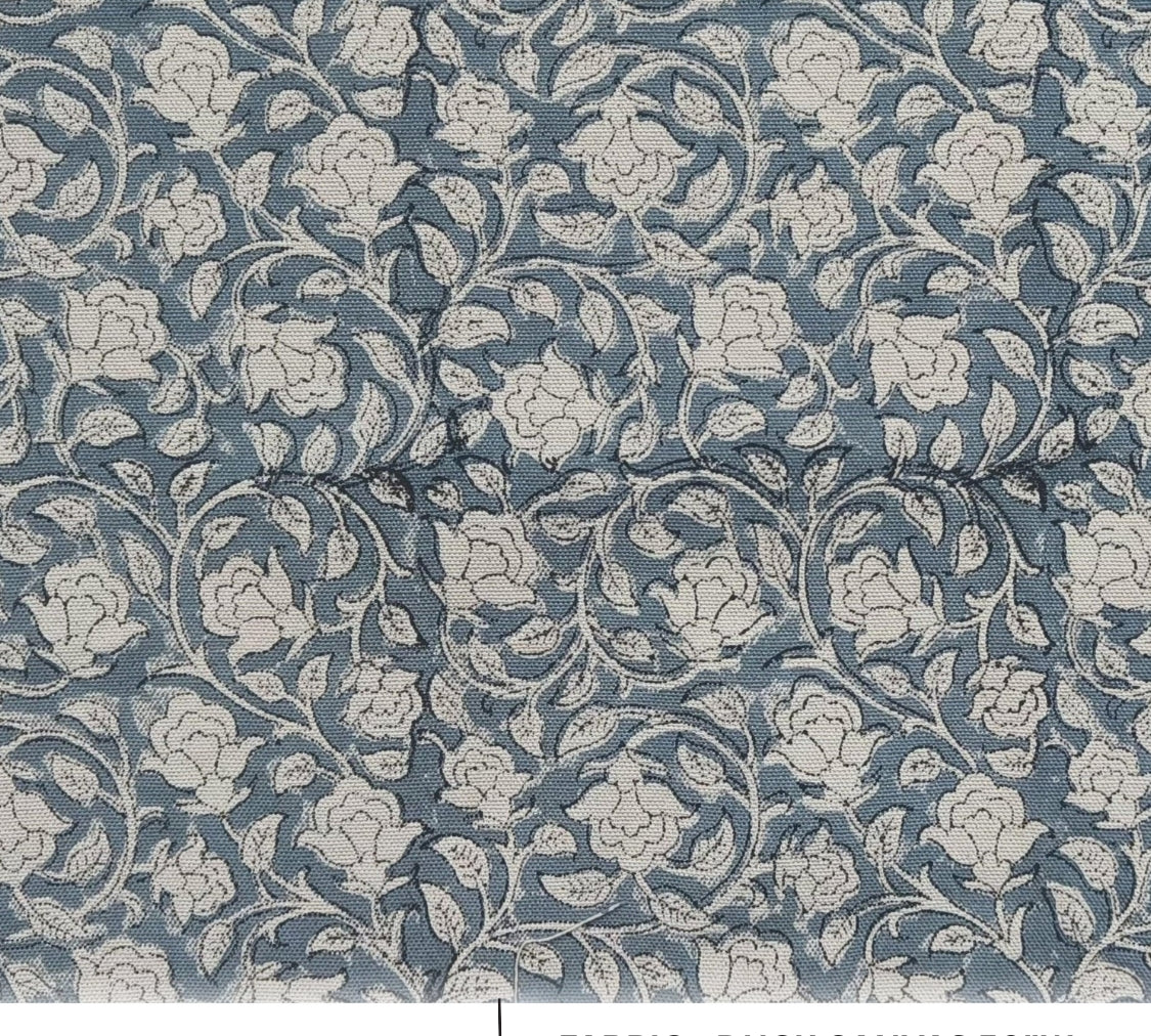 Floral patterned fabric with 'Amrit Vela' print on duck canvas