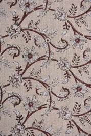 Textile with floral and paisley pattern on a beige background