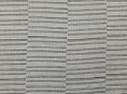 Zoomed-in image of BAIKUNTH's fabric featuring bold stripes