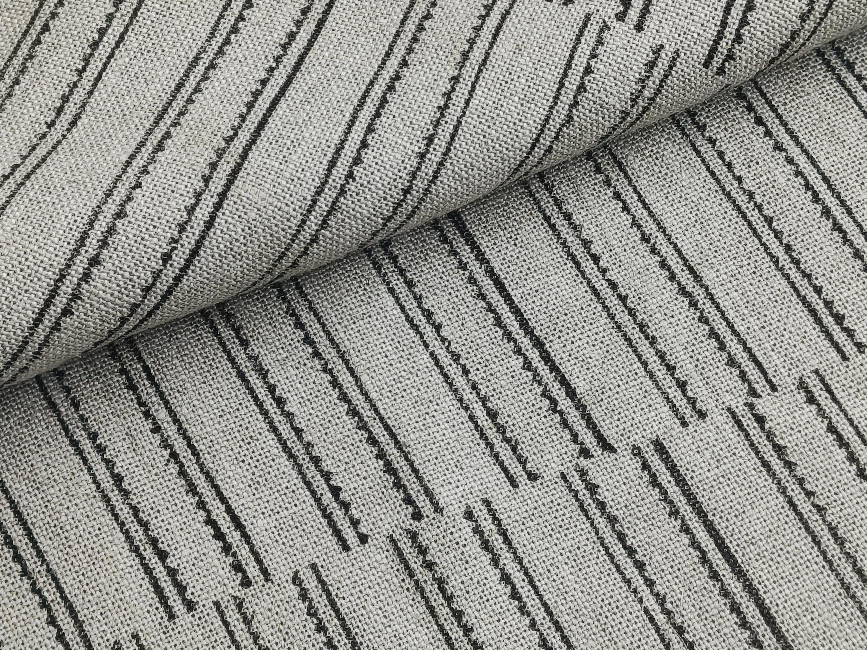 Macro shot of BAIKUNTH's signature black and white striped cloth