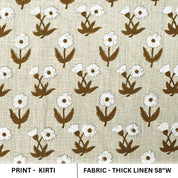 Patterned fabric with white flowers and brown leaves on a beige background