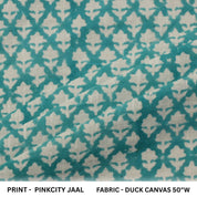 Patterned fabric with geometric design on a teal and beige background